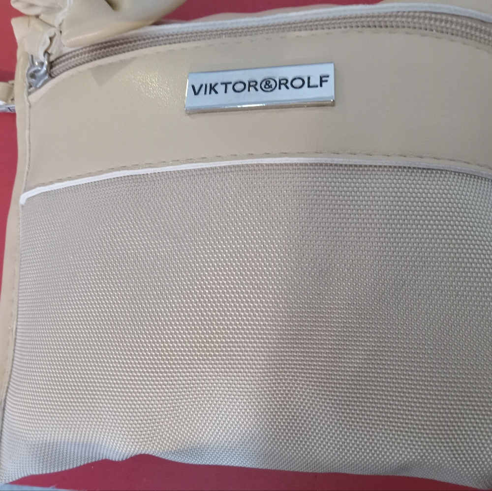 Viktor & Rolf- cream beige small amenities bag/clutch with zipper
